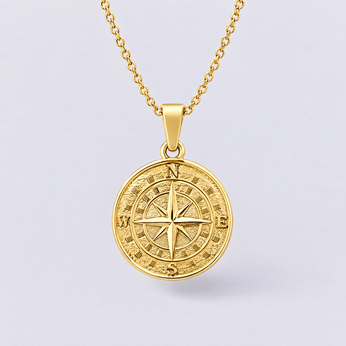 Gold compass pendant necklace front view